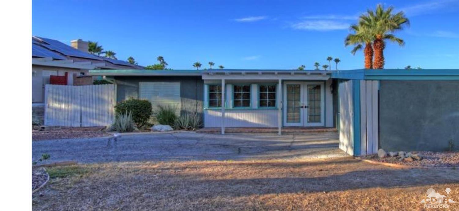 42637 East Veldt Street Rancho Mirage, CA 92270 - Photo 2 of 11 a view of a house with a yard and plants