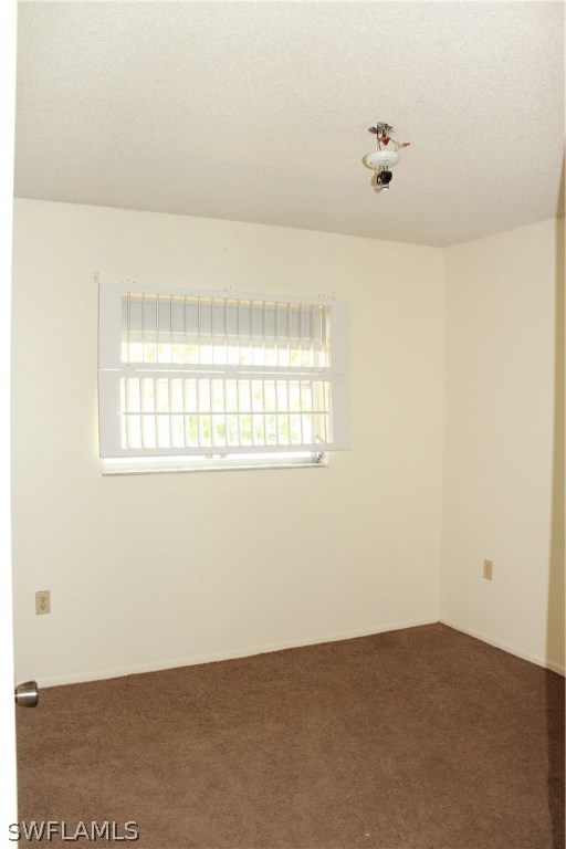 19100 Evergreen Road Fort Myers, FL 33967 - Photo 16 of 25 a view of an empty room with a window