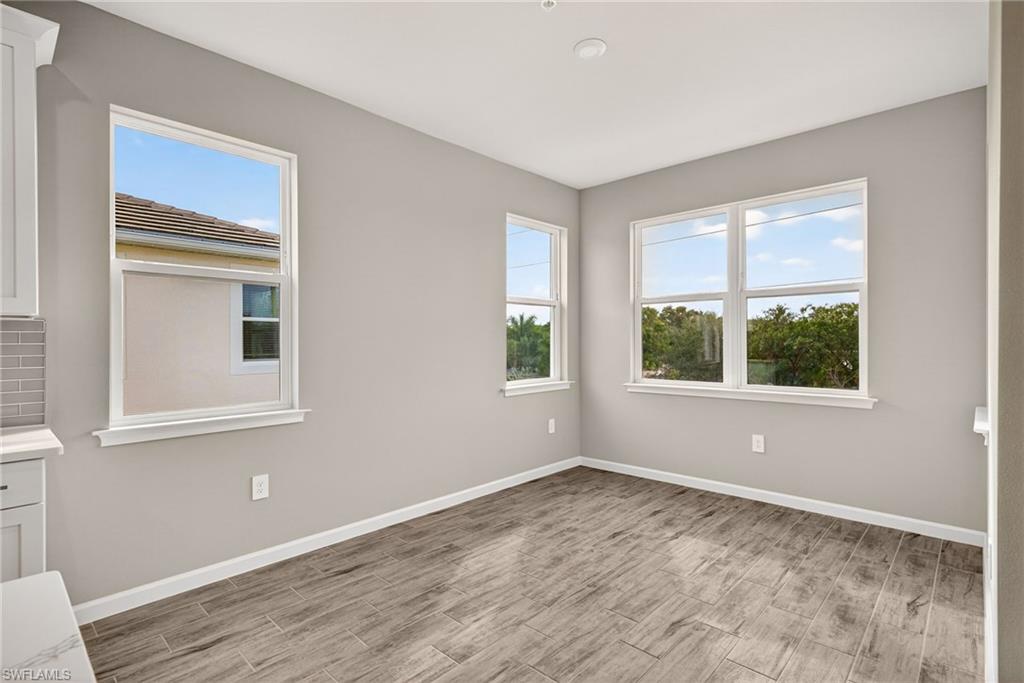 4646 Arboretum Circle, Unit 201 Naples, FL 34112 - Photo 14 of 26 Master Bedroom