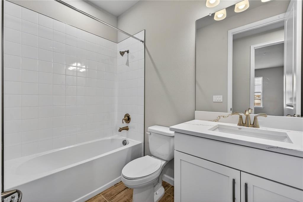 4646 Arboretum Circle, Unit 201 Naples, FL 34112 - Photo 22 of 26 Guest Bathroom