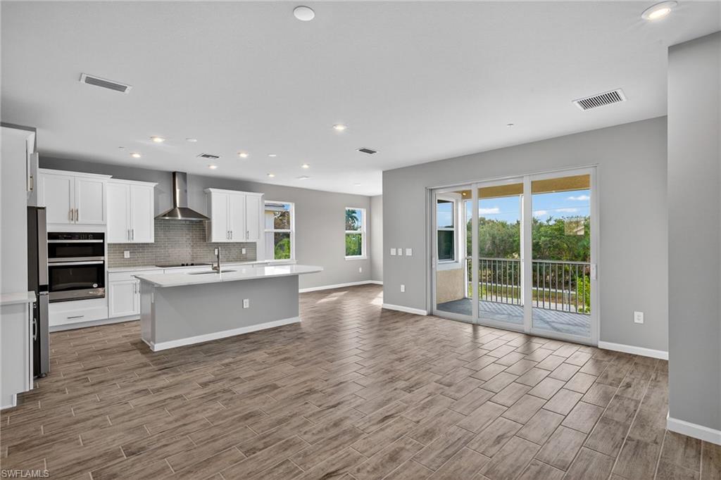 4646 Arboretum Circle, Unit 201 Naples, FL 34112 - Photo 6 of 26 Kitchen, dining area