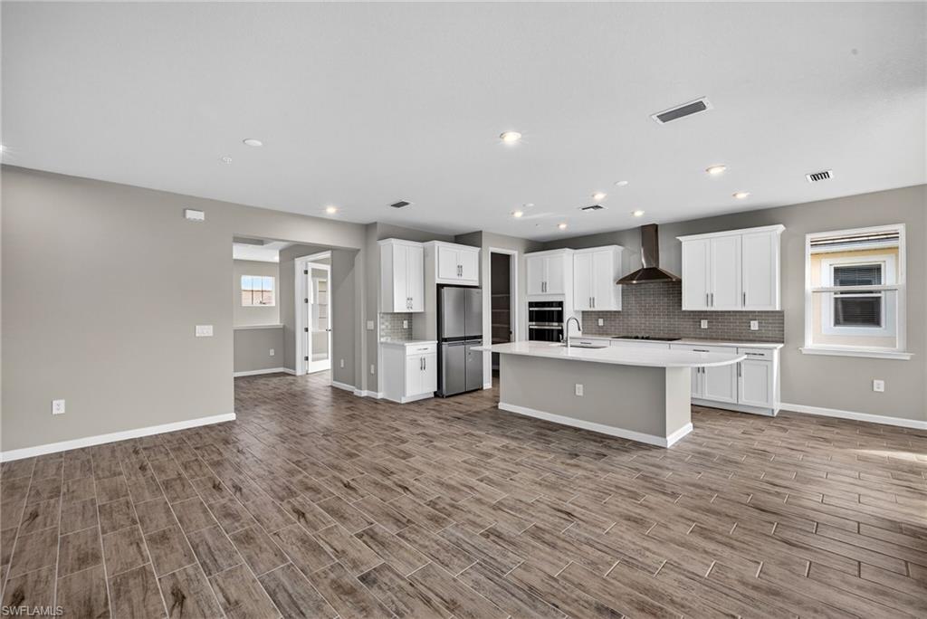 4646 Arboretum Circle, Unit 201 Naples, FL 34112 - Photo 7 of 26 Living area, Kitchen