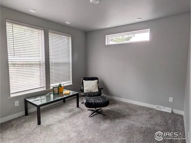 a living room with a window