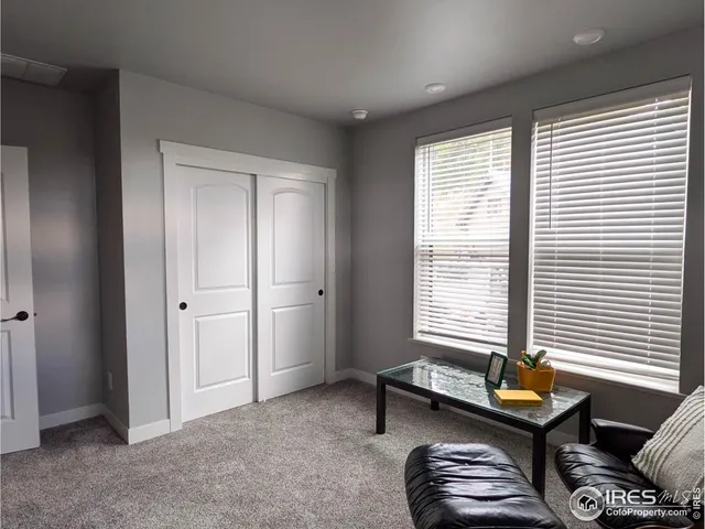 a room with furniture and window