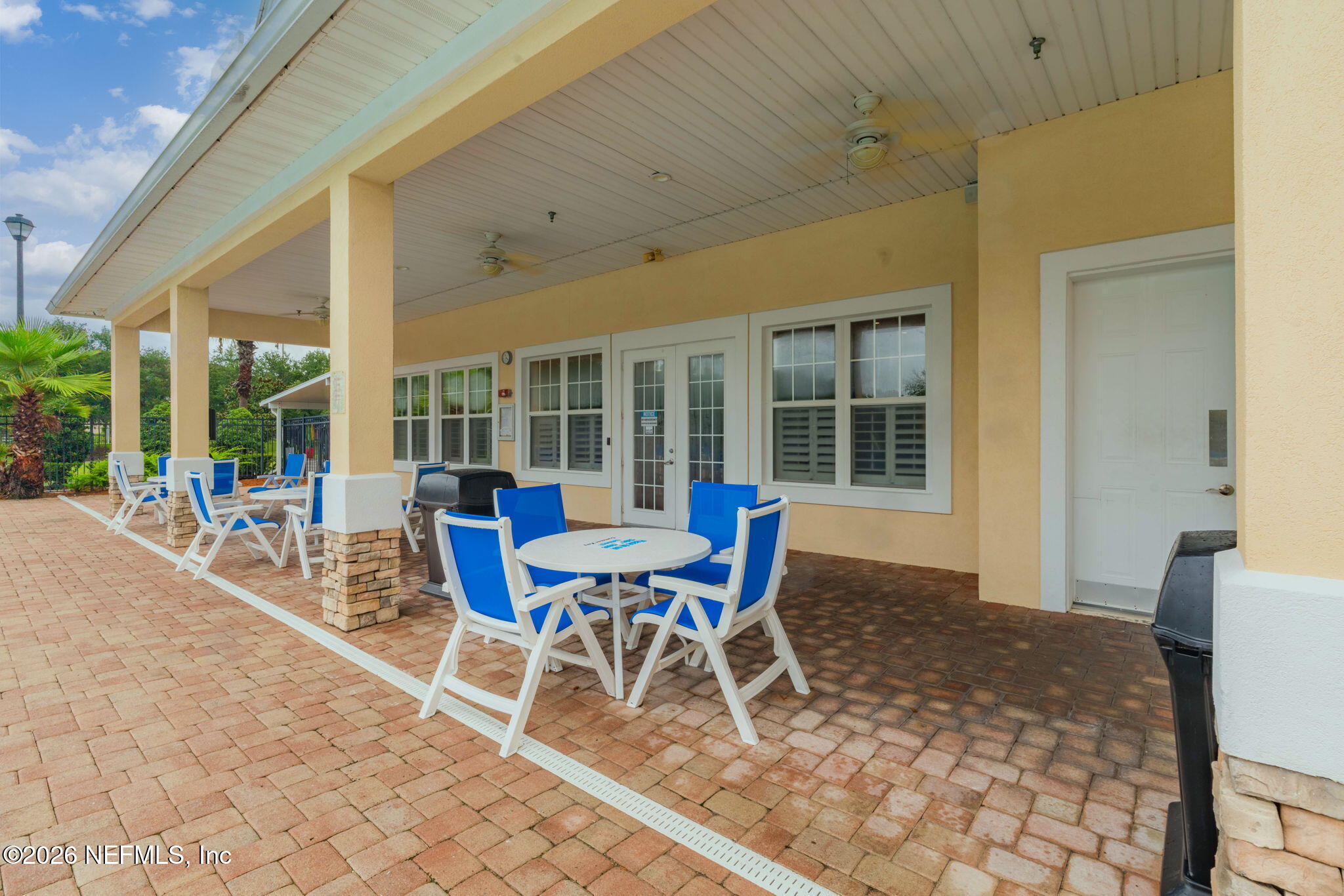 8218 Green Parrot Road, Unit 105 Jacksonville, FL 32256 - Photo 32 of 42 a view of a dining room with furniture and wooden floor