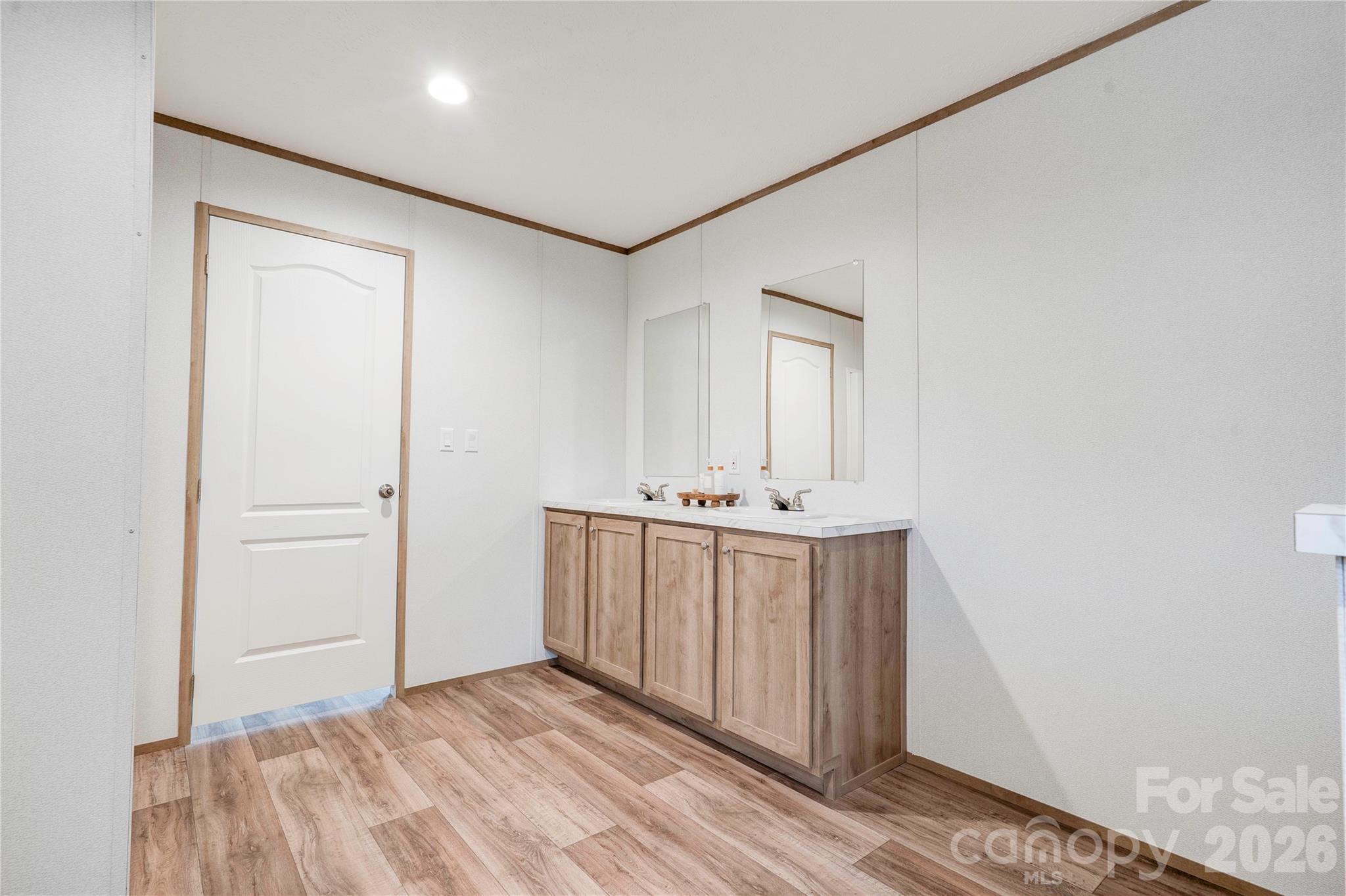 1249 Cleveland Avenue Grover, NC 28073 - Photo 20 of 34 a bathroom with a sink and a mirror