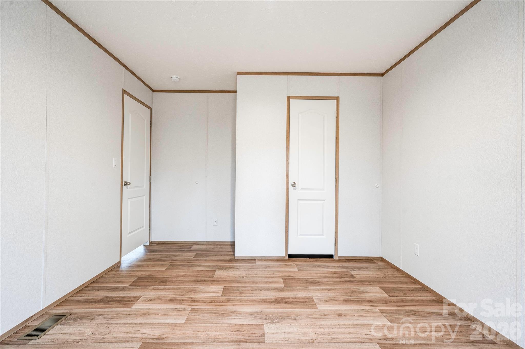 1249 Cleveland Avenue Grover, NC 28073 - Photo 26 of 34 a view of a room with wooden floor