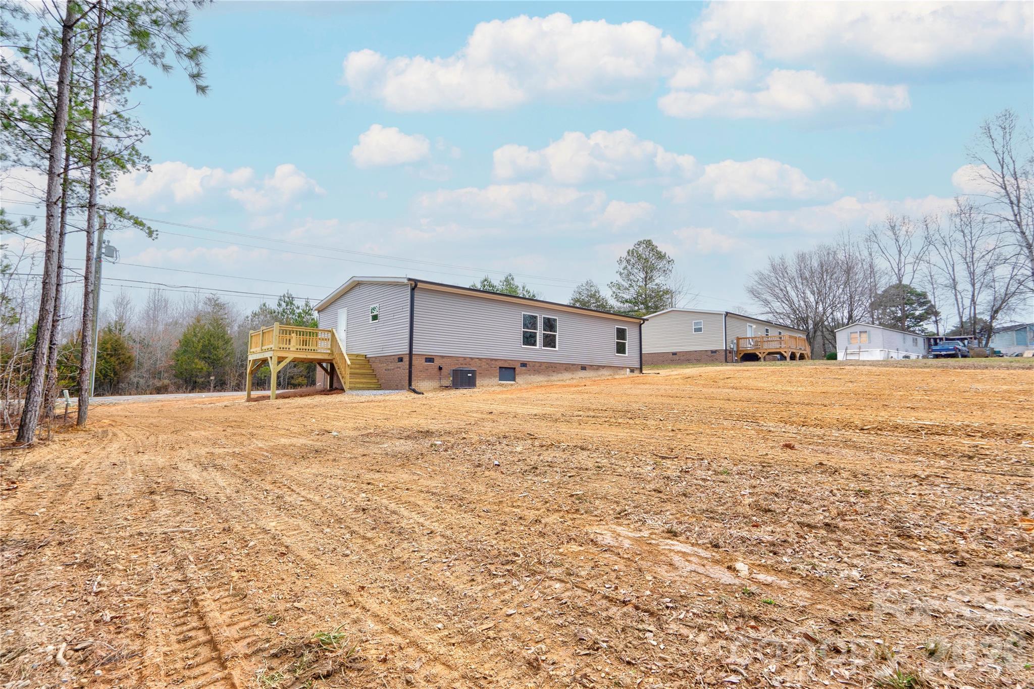 1249 Cleveland Avenue Grover, NC 28073 - Photo 33 of 34 a view of a house with snow on the road