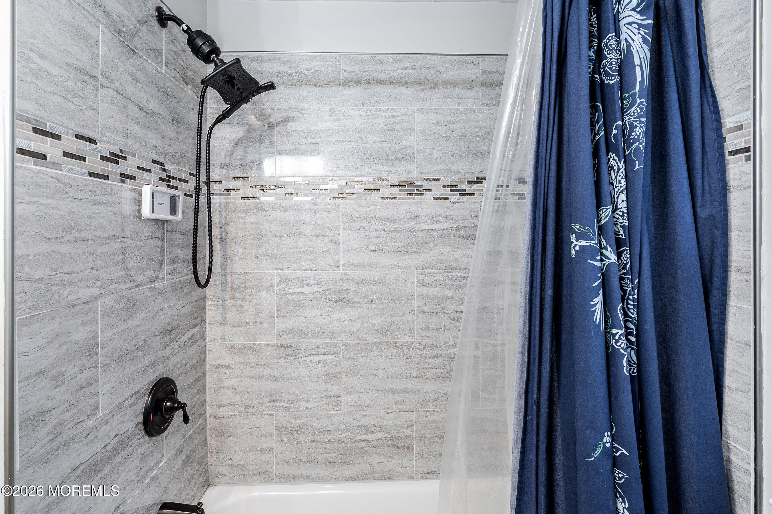 329 Briggs Avenue Forked River, NJ 08731 - Photo 12 of 16 a bathroom with a shower