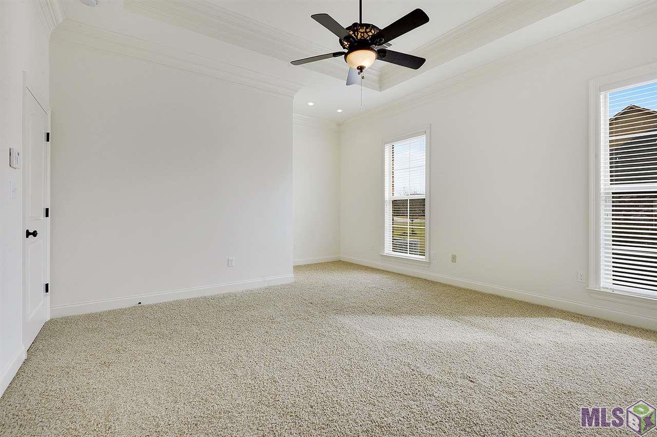10483 Buddy Gore Road Gonzales, LA 70737 - Photo 11 of 21 Master Bedroom with sitting area