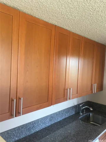 an empty room with wooden floor