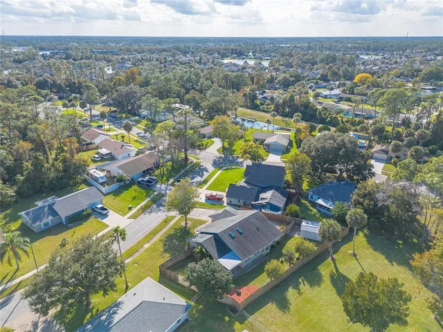a view of a city with mountains in the background