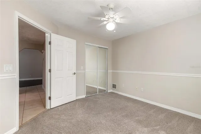 an empty room with a bathroom