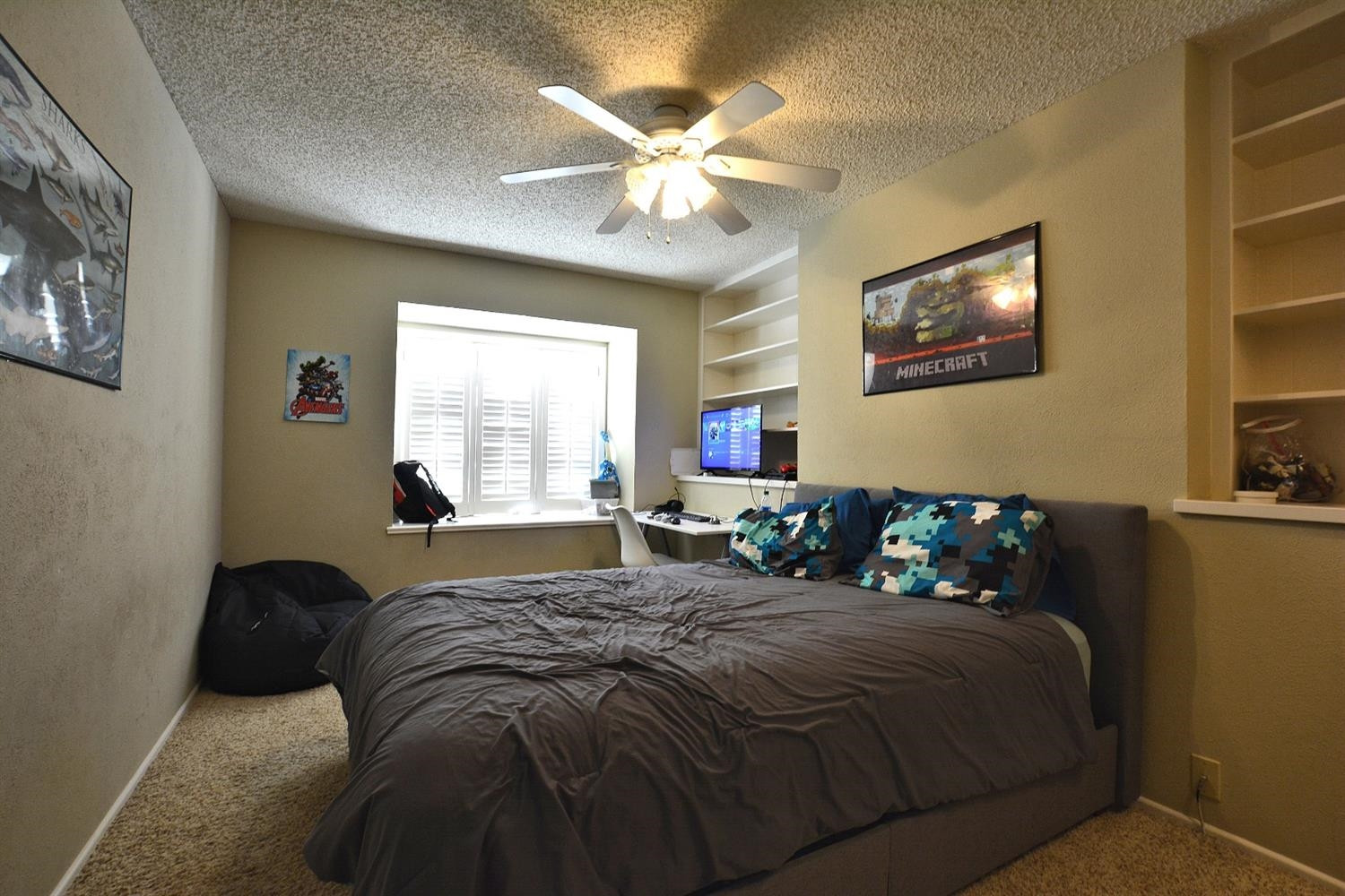 3307 74th Street, Unit A Lubbock, TX 79423 - Photo 12 of 19 a bedroom with a bed and window
