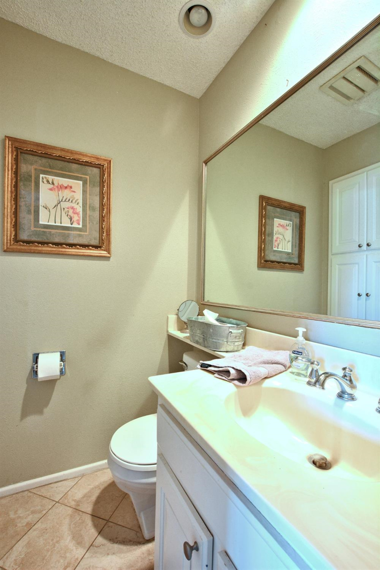 3307 74th Street, Unit A Lubbock, TX 79423 - Photo 6 of 19 a bathroom with a sink and a mirror