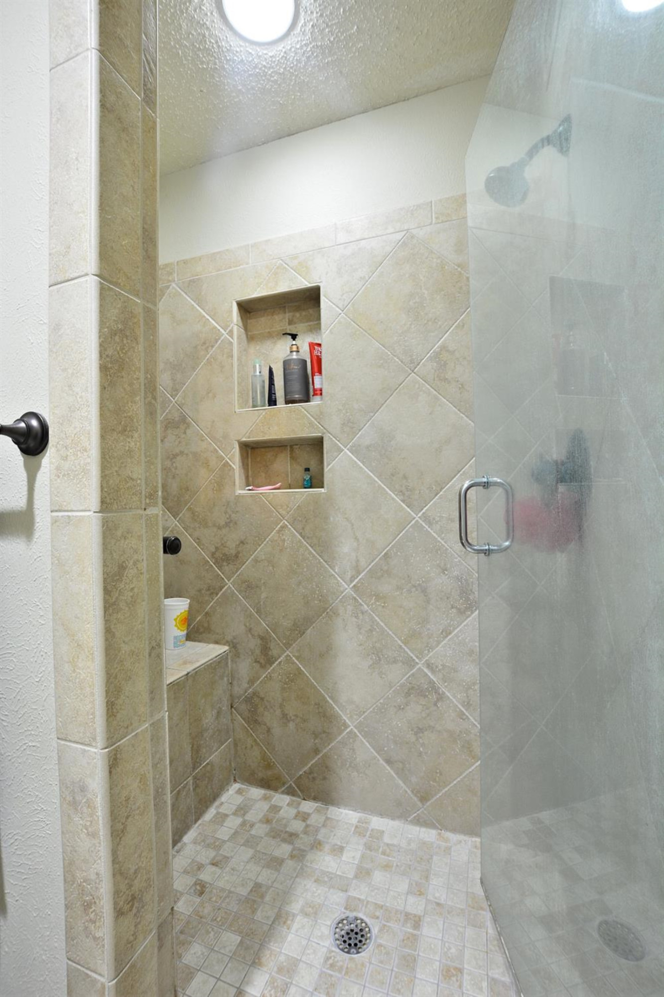 3307 74th Street, Unit A Lubbock, TX 79423 - Photo 10 of 19 a bathroom with a shower