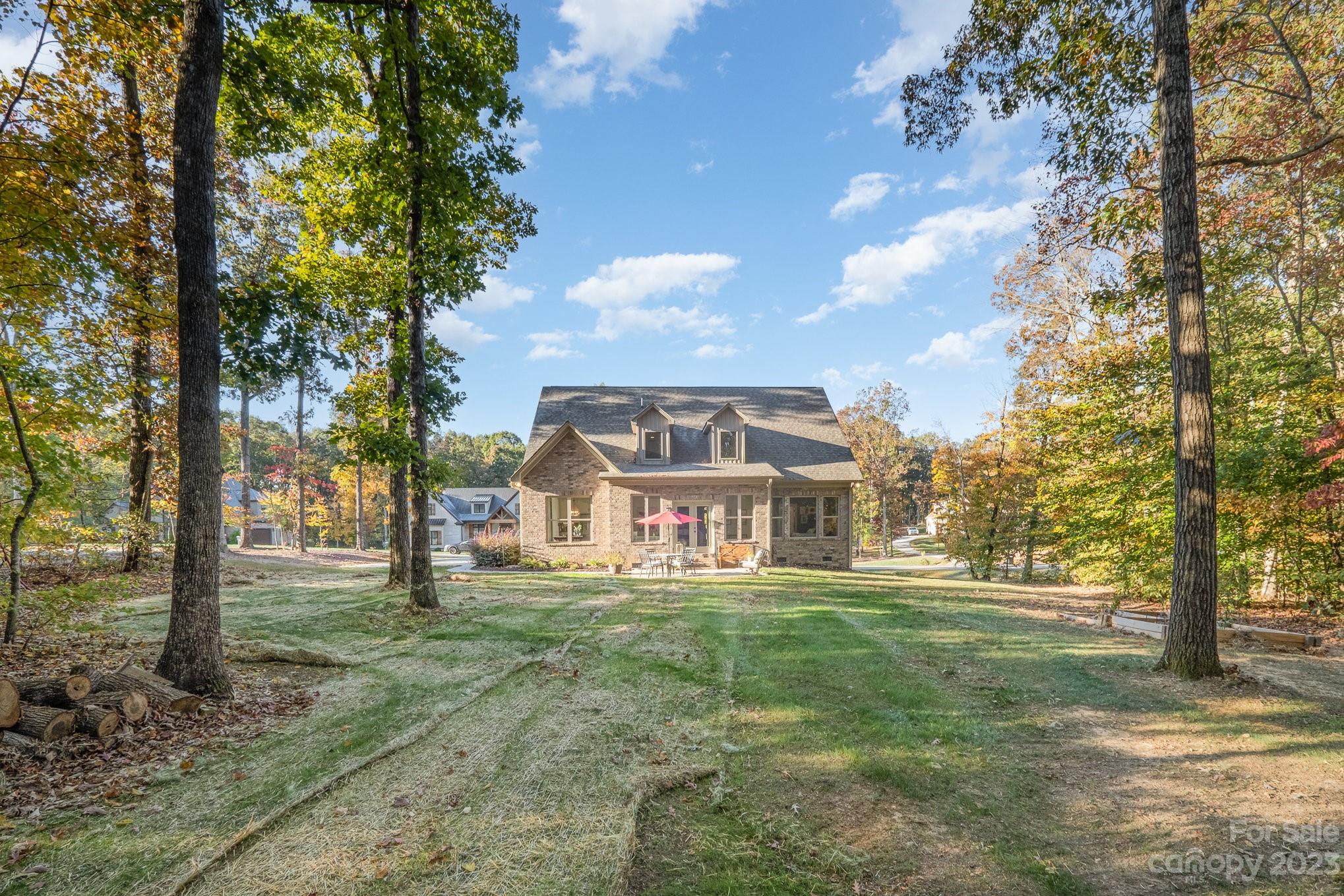 1007 Flat Rock Drive Monroe, NC 28110 - Photo 31 of 34 a view of a big yard with large trees and a big yard