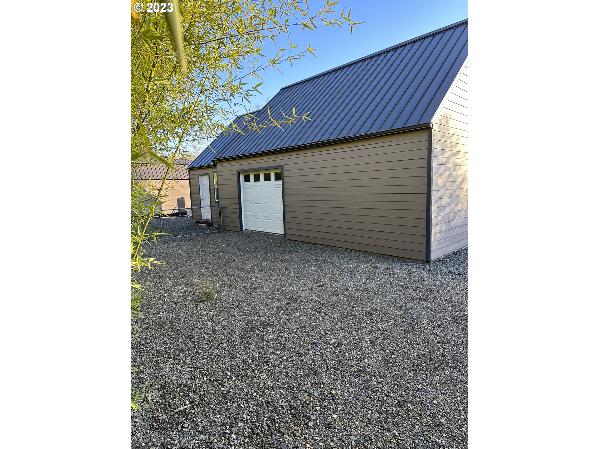 1601 7th Street Springfield, OR 97477 - Photo 3 of 16 a view of a house with a backyard