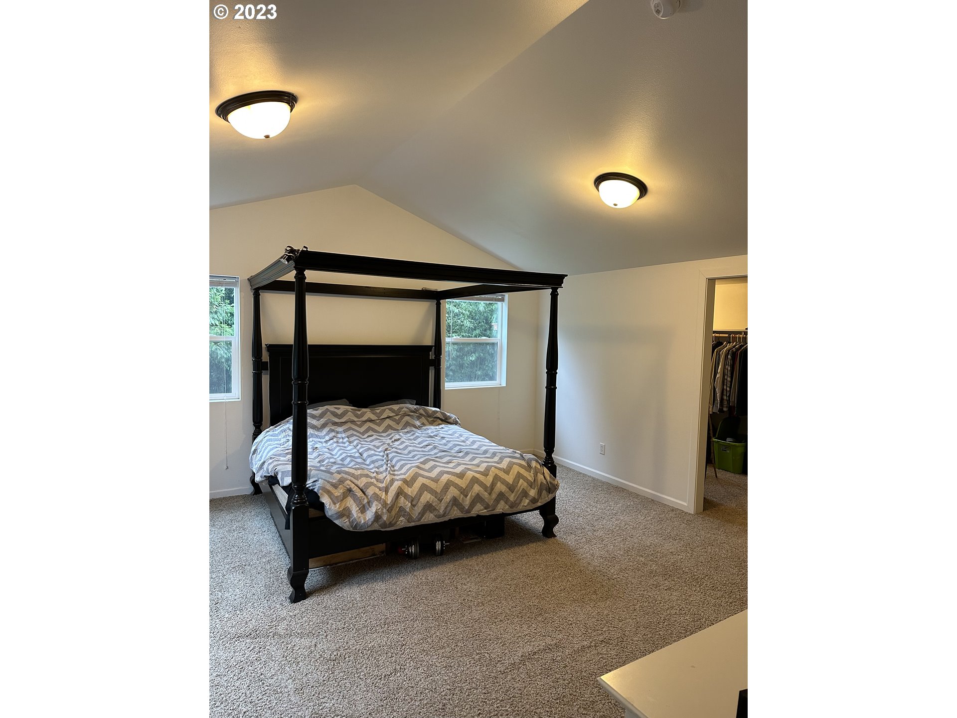 1601 7th Street Springfield, OR 97477 - Photo 7 of 16 a bedroom with a bed and a night stand