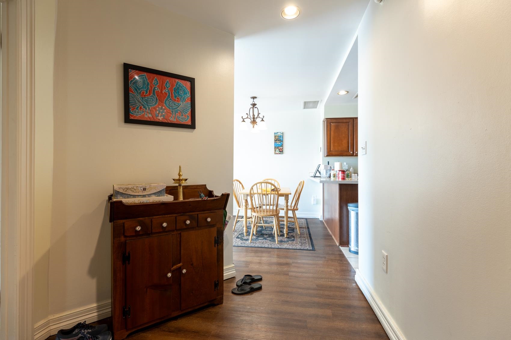 655 Riverside Drive, Unit 1008A Memphis, TN 38103 - Photo 9 of 10 Corridor with a chandelier, dark wood-style flooring, and recessed lighting