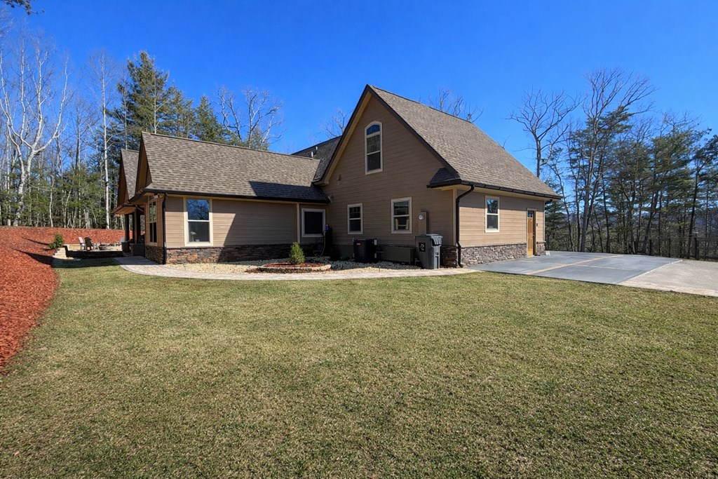 3331 Gumlog Road Young Harris, GA 30582 - Photo 2 of 39 a front view of a house with a yard