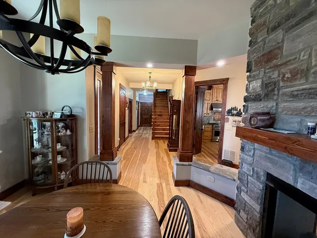 a view of a livingroom with furniture and staircase