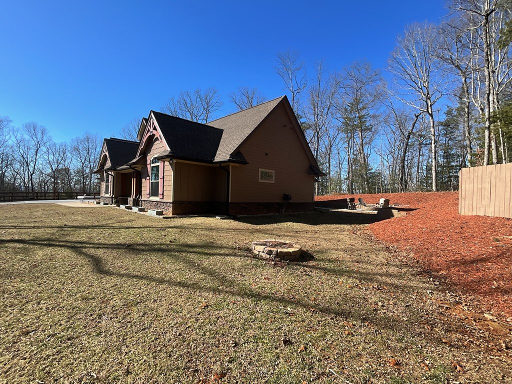 3331 Gumlog Road Young Harris, GA 30582 - Photo 7 of 39 a front view of a house with a yard