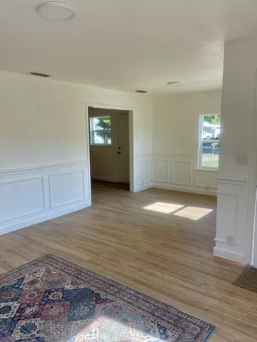 a kitchen with stainless steel appliances a sink and a stove