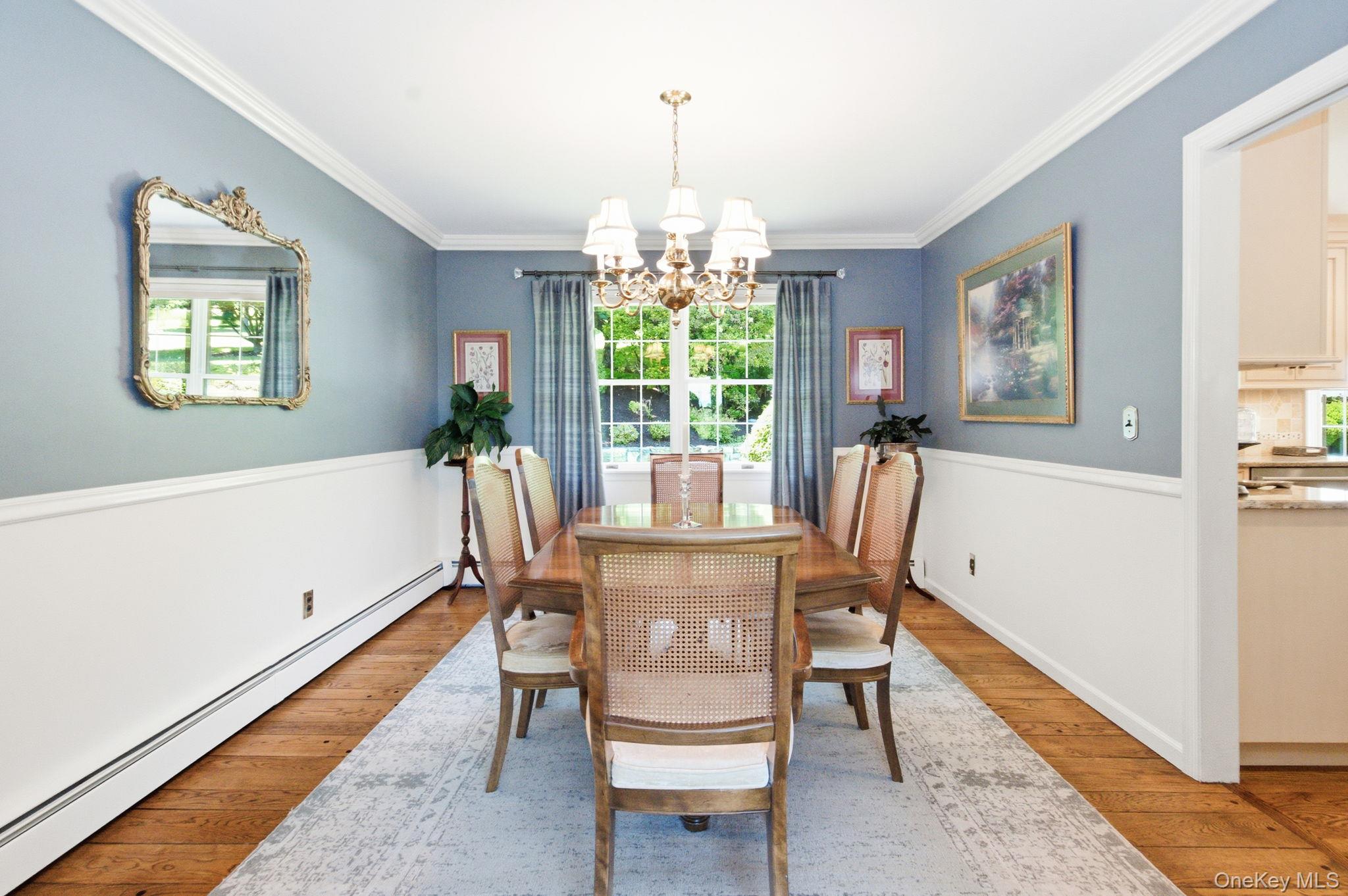 32 Bedell Road Katonah, NY 10536 - Photo 7 of 49 Variegated-width peg hardwood floors distinguish the formal dining room.