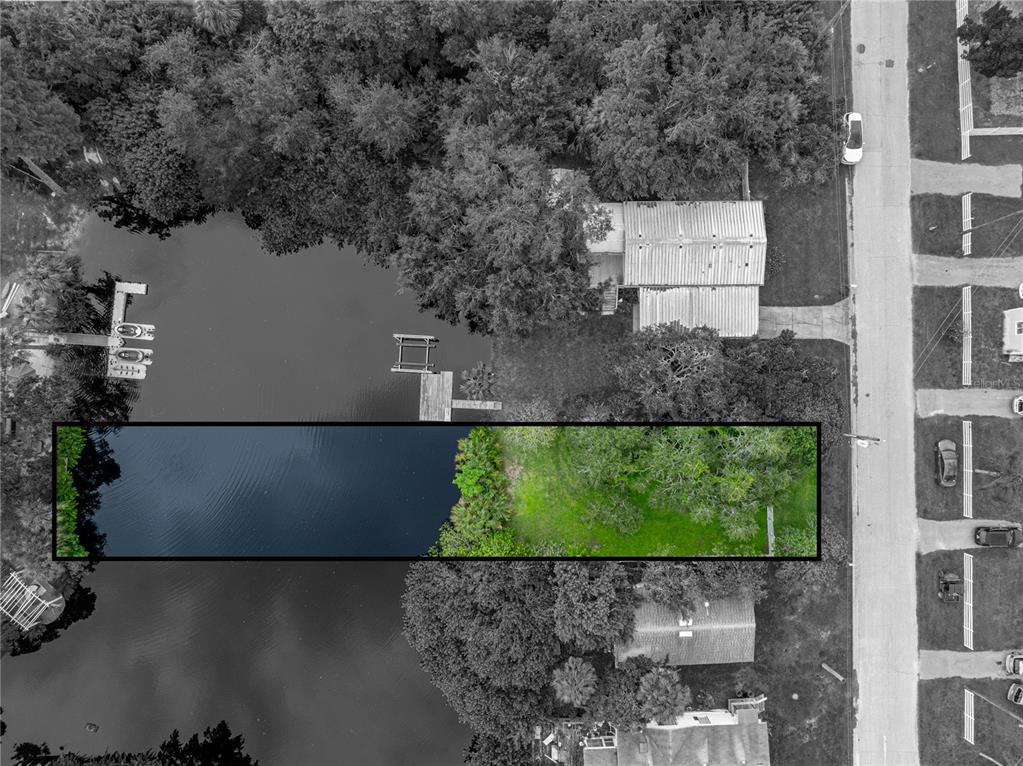 0 Flounder Drive Hudson, FL 34667 - Photo 3 of 13 an aerial view of a house with a yard