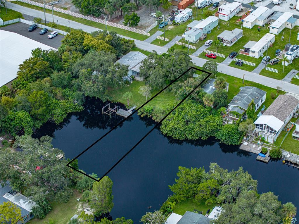 0 Flounder Drive Hudson, FL 34667 - Photo 5 of 13 an aerial view of a house with a yard and outdoor space