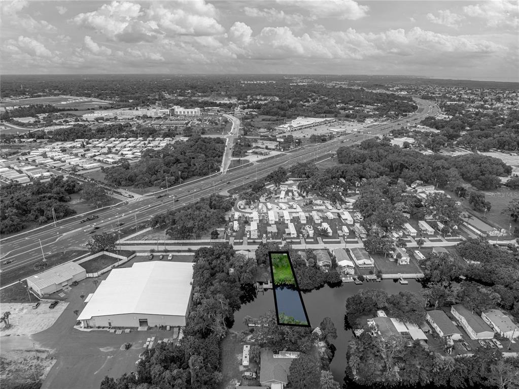 0 Flounder Drive Hudson, FL 34667 - Photo 7 of 13 an aerial view of a house with a yard