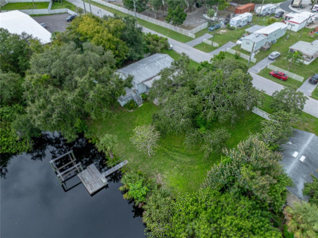 0 Flounder Drive Hudson, FL 34667 - Photo 9 of 13 an aerial view of a house with a yard and street view
