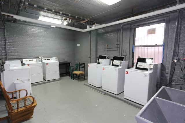 4735 North Beacon Street, Unit 307 Chicago, IL 60640 - Photo 15 of 15 a utility room with dryer and washer