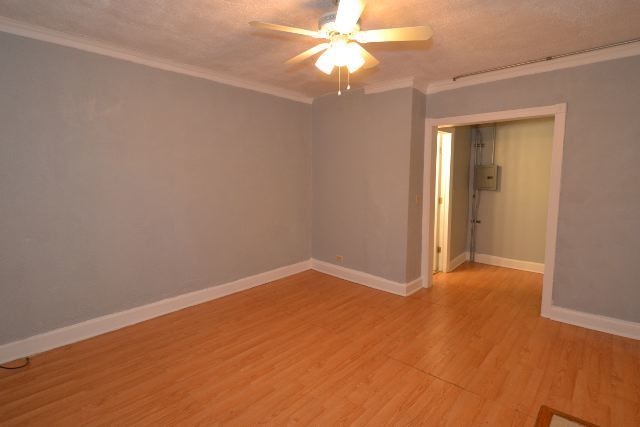 4735 North Beacon Street, Unit 307 Chicago, IL 60640 - Photo 10 of 15 a view of an empty room with a window