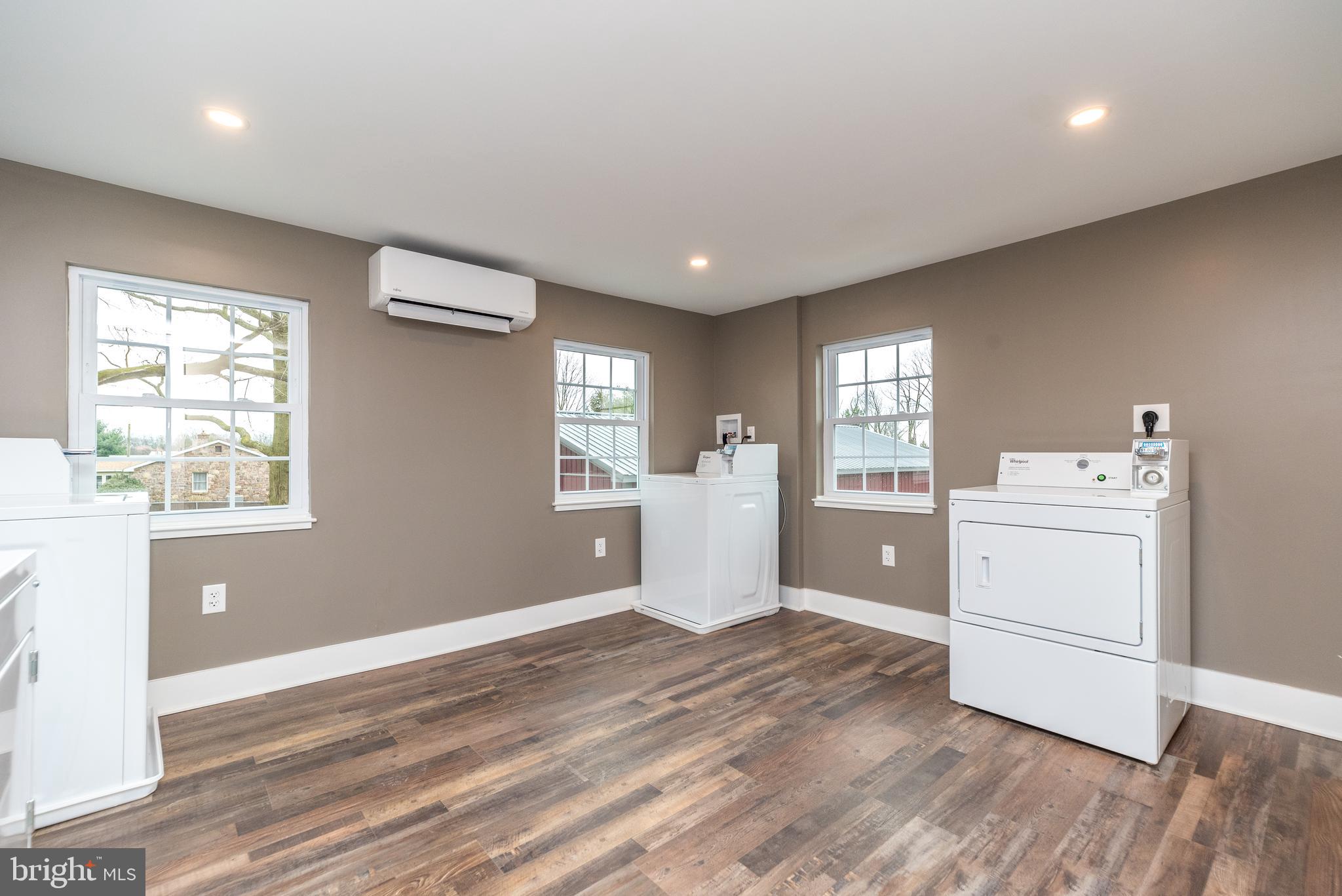 4844 Old Easton Road, Unit 2 Doylestown, PA 18902 - Photo 31 of 33 a room with a hardwood kitchen view and a window