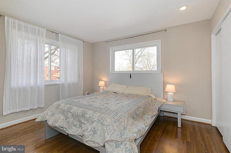 12912 Holdridge Road Silver Spring, MD 20906 - Photo 11 of 25 a bedroom with a bed and a window