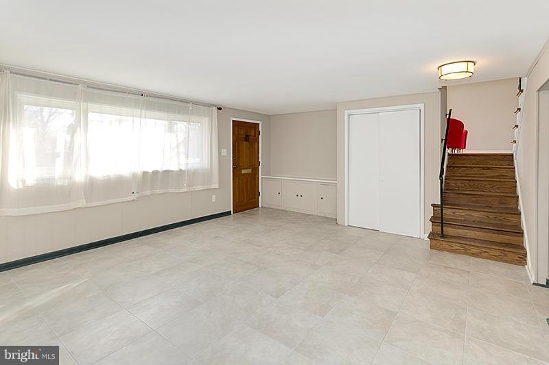 12912 Holdridge Road Silver Spring, MD 20906 - Photo 19 of 25 a view of an empty room with a window