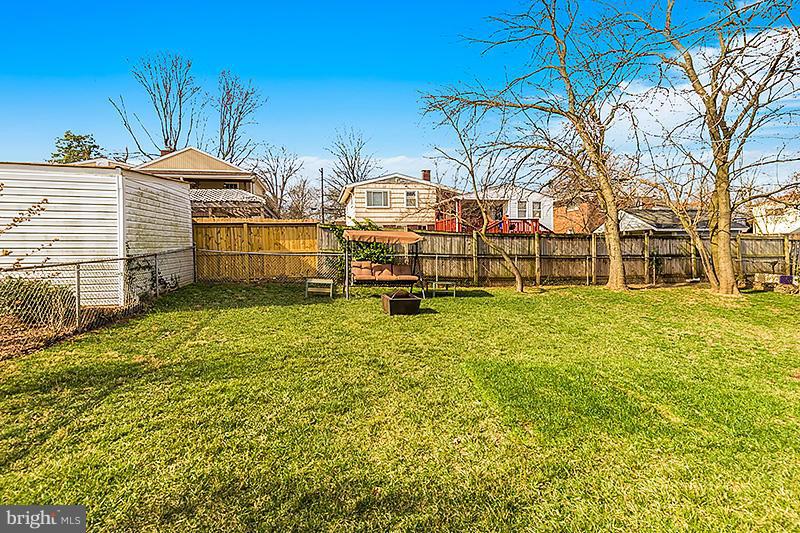 12912 Holdridge Road Silver Spring, MD 20906 - Photo 24 of 25 a view of a house with a yard