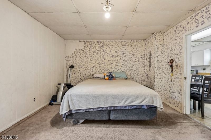 50 Preston Street Ridgefield Park, NJ 07660 - Photo 26 of 41 a bedroom with a bed and a walk in closet