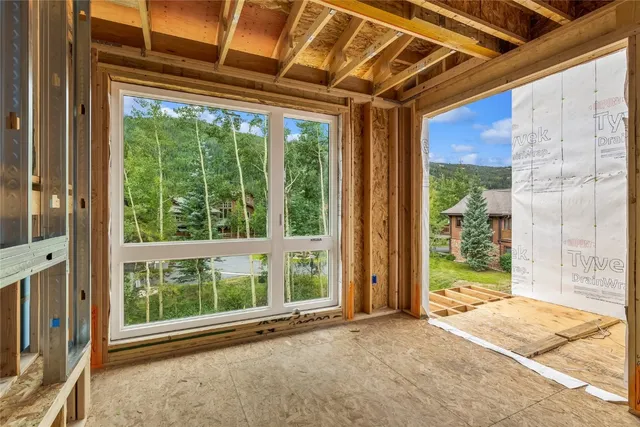 a view of a room with a large window