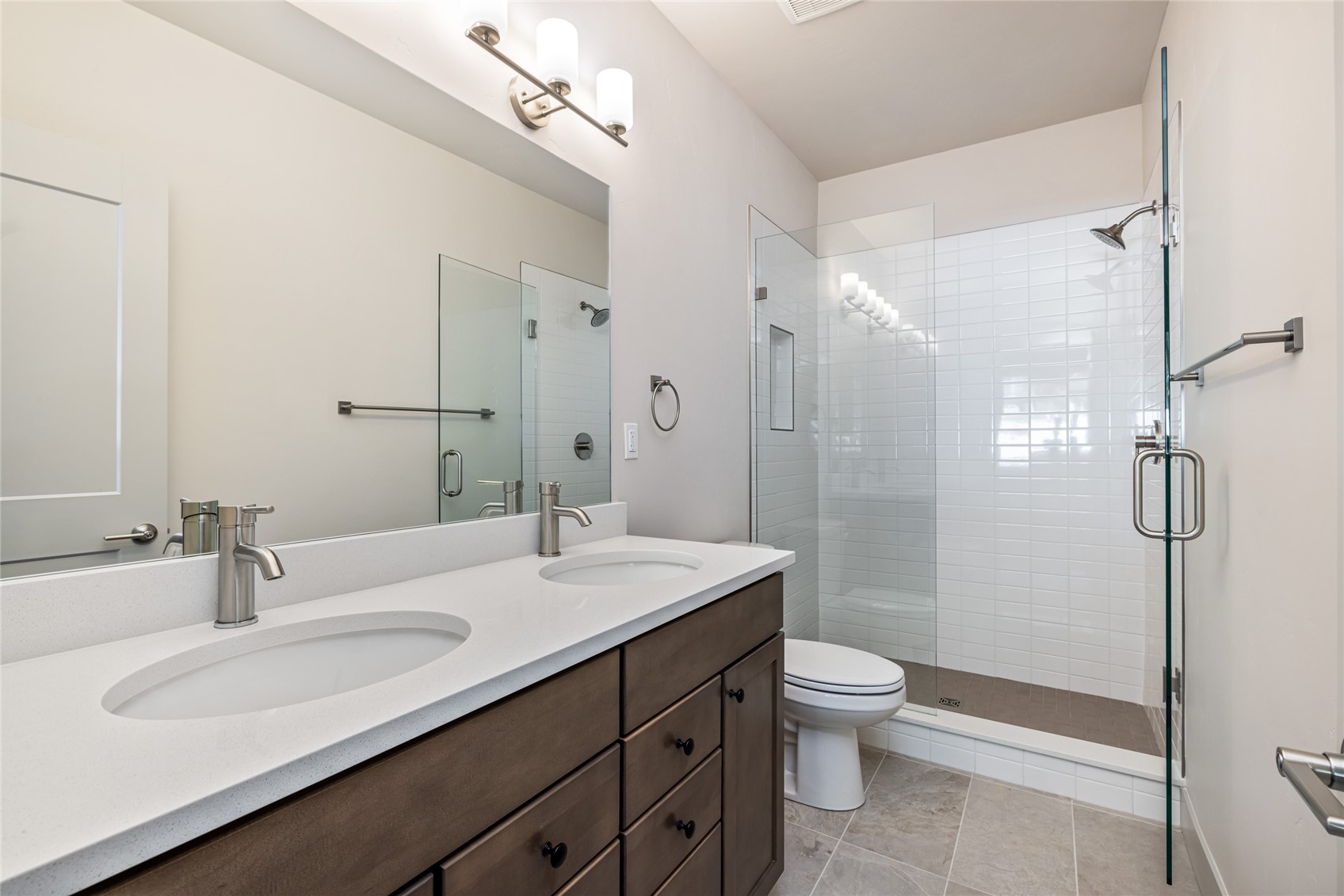 628 Montezuma Road, Unit D2 Keystone, CO 80435 - Photo 17 of 25 a bathroom with a sink a toilet and shower