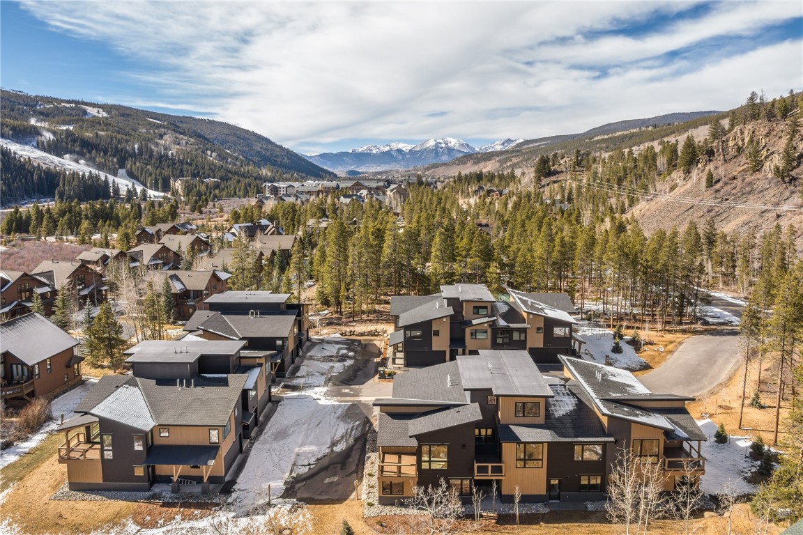 628 Montezuma Road, Unit D2 Keystone, CO 80435 - Photo 21 of 28 a view of a city with mountains in the background