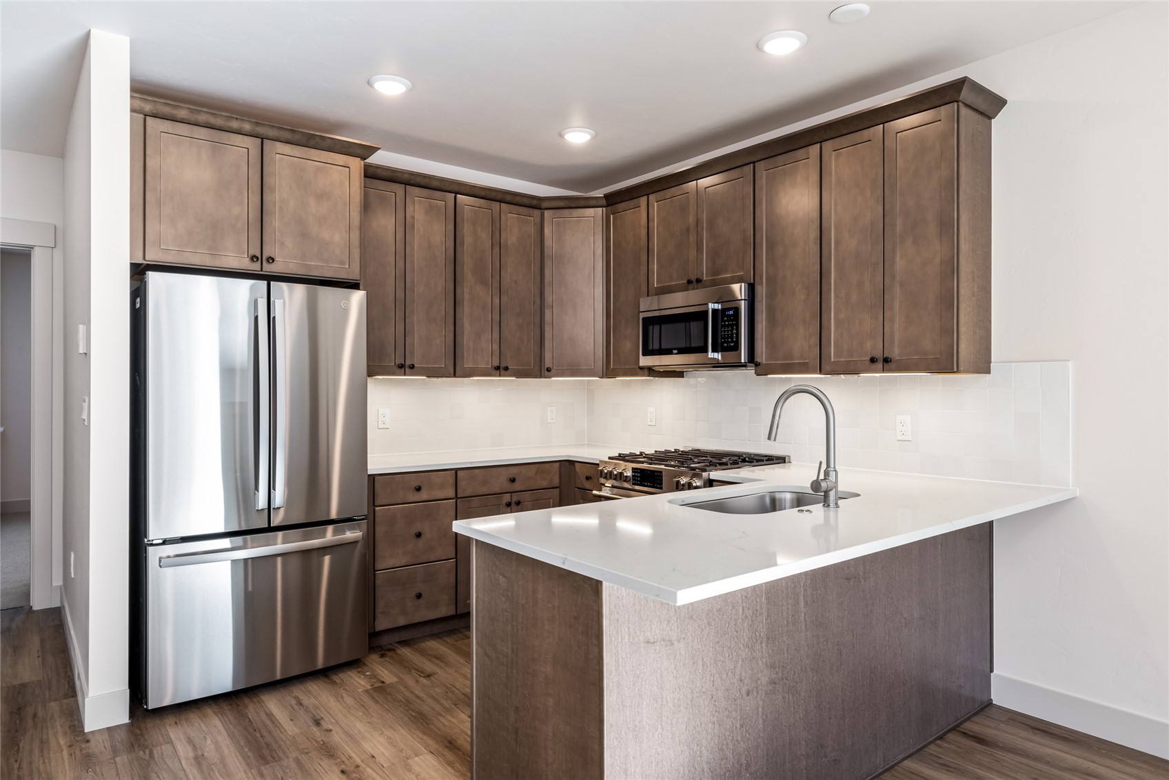 628 Montezuma Road, Unit D2 Keystone, CO 80435 - Photo 5 of 25 a kitchen with appliances a sink and a refrigerator