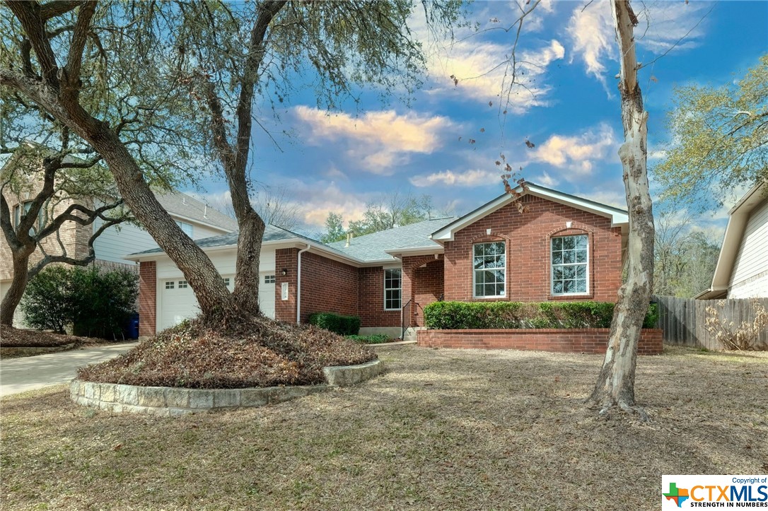 7108 Bending Oak Road Austin, TX 78749 - Photo 1 of 1 a front view of a house with a yard