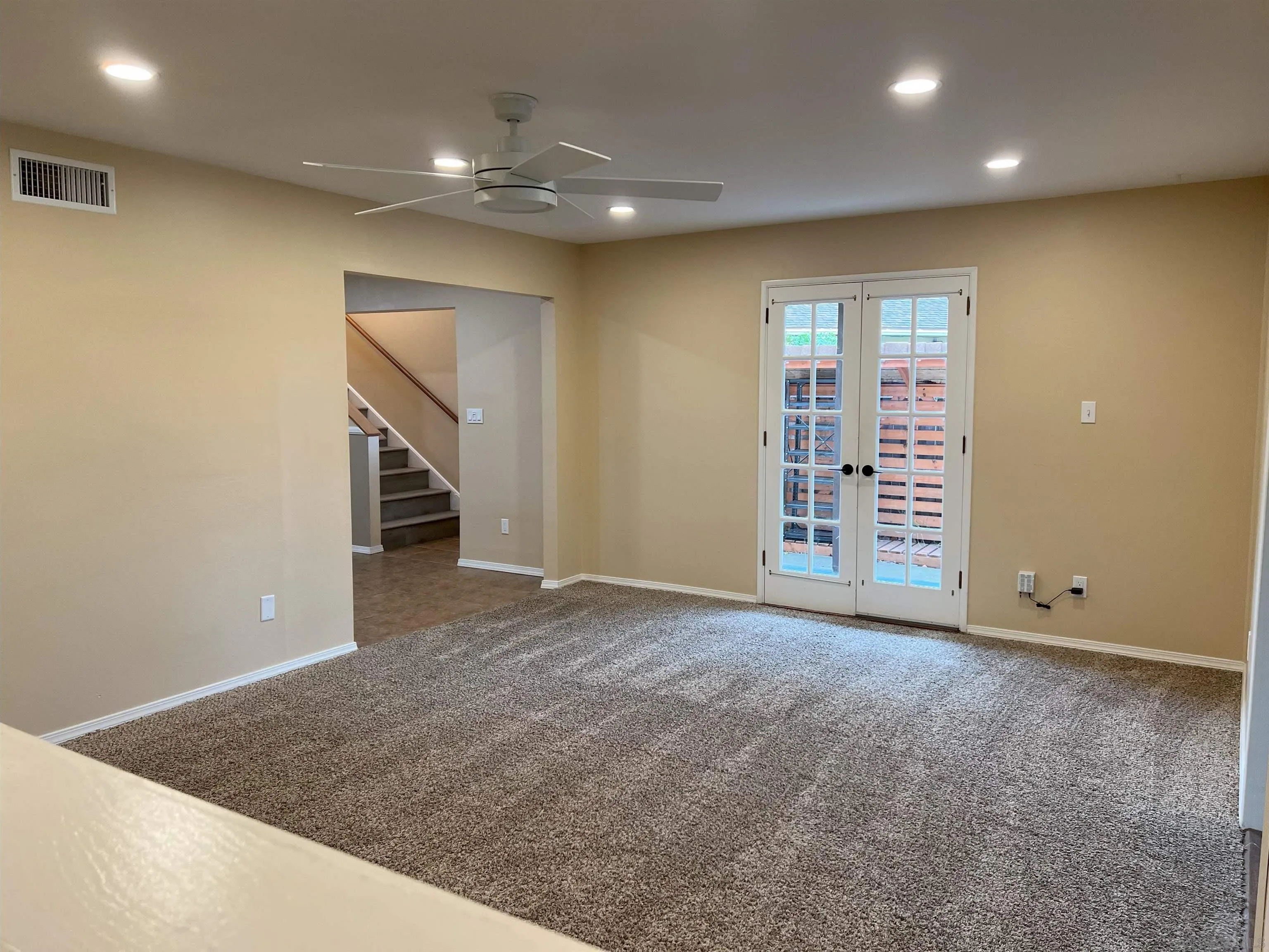 4054 Mt Barnard Avenue San Diego, CA 92111 - Photo 11 of 55 an empty room with a empty space and windows