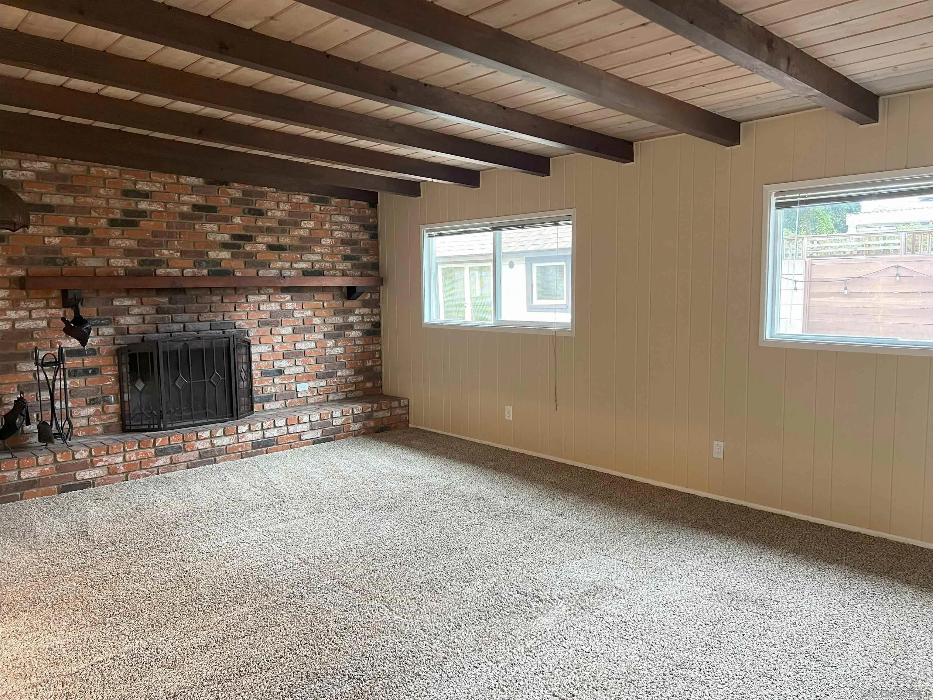 4054 Mt Barnard Avenue San Diego, CA 92111 - Photo 16 of 55 a view of empty room with a fireplace