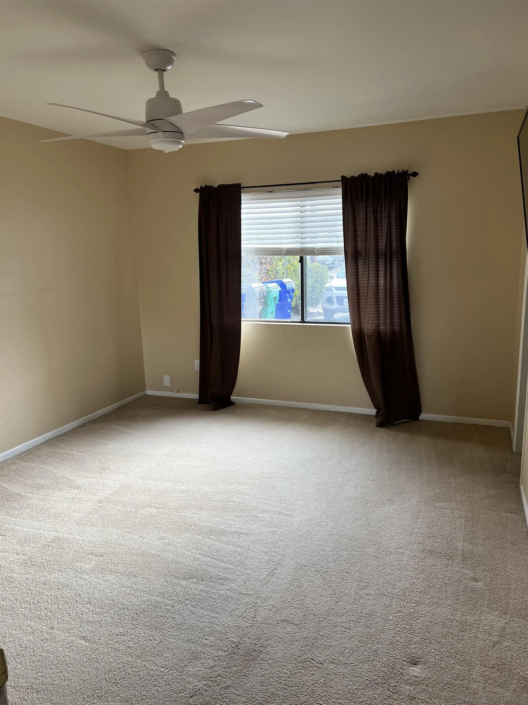 4054 Mt Barnard Avenue San Diego, CA 92111 - Photo 20 of 55 a view of an empty room with a window