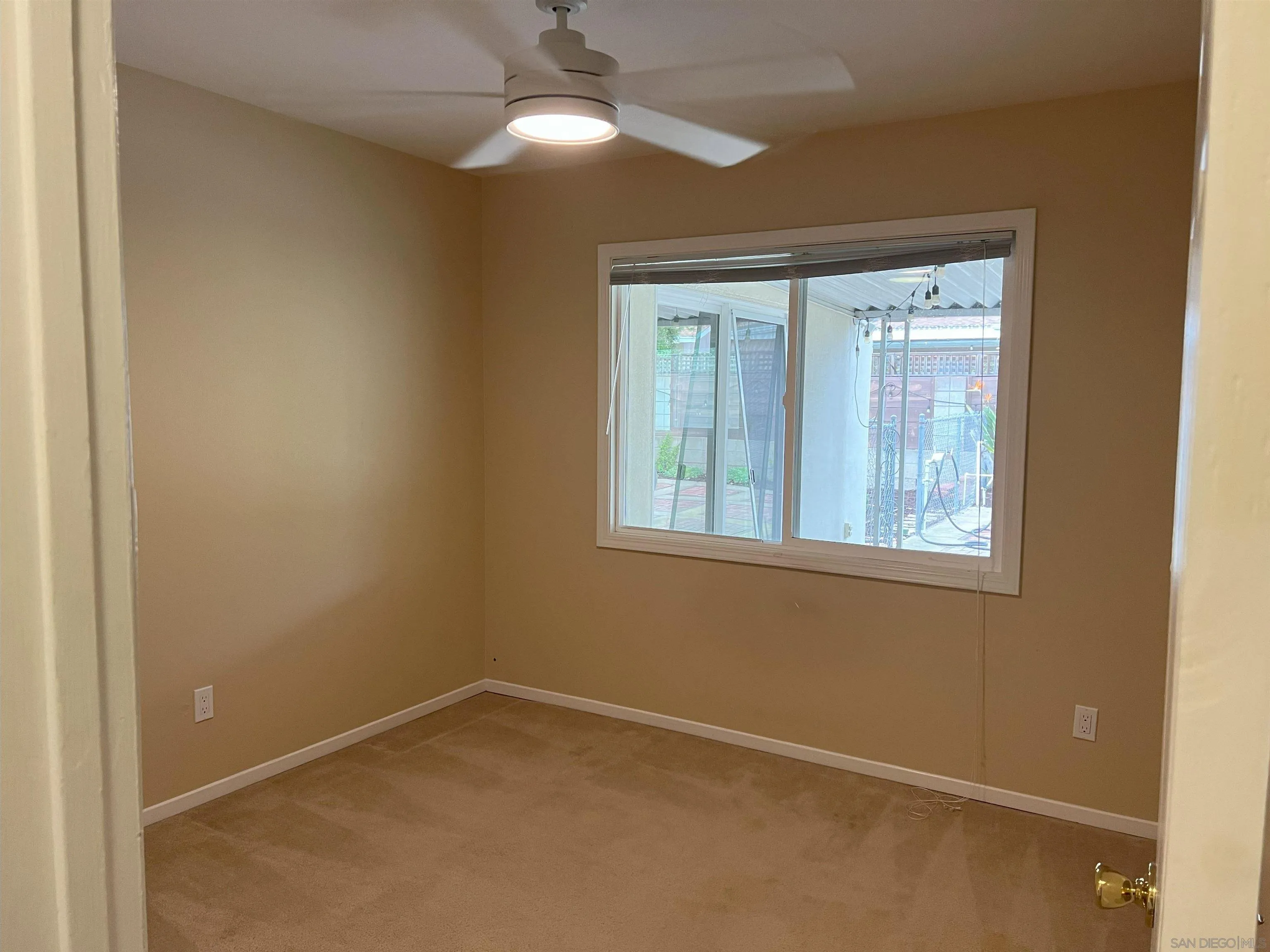 4054 Mt Barnard Avenue San Diego, CA 92111 - Photo 27 of 55 an empty room with a window