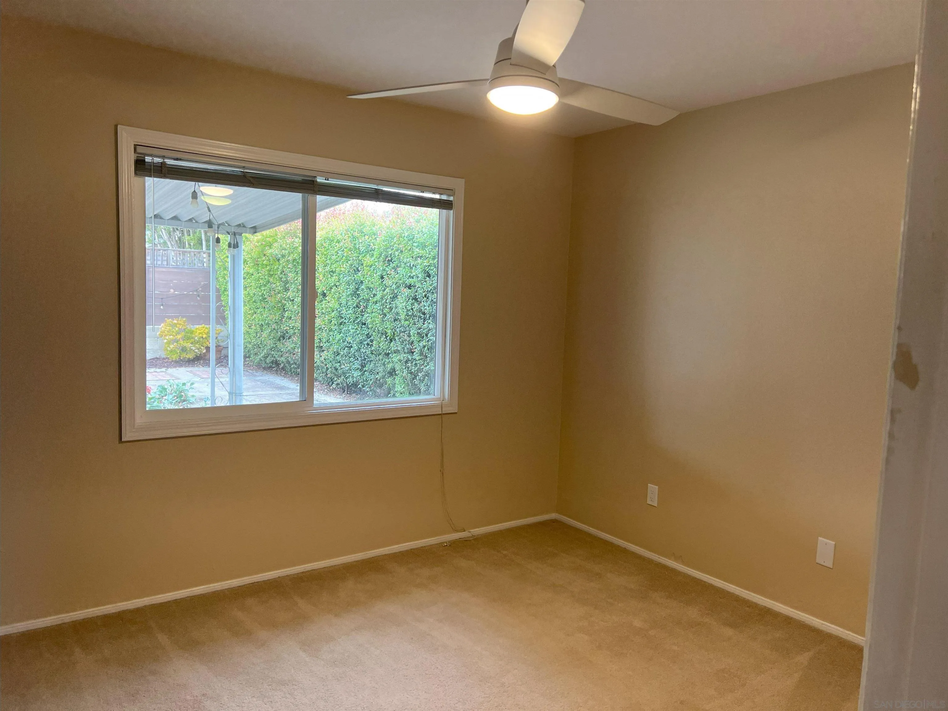 4054 Mt Barnard Avenue San Diego, CA 92111 - Photo 29 of 55 an empty room with a window